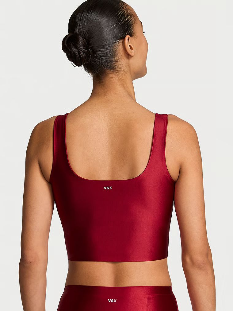 Top sportowy z błyszczącego materiału VSX GlossyTech. Produkt ma kolor czerwony i pochodzi z kolekcji VSX. 