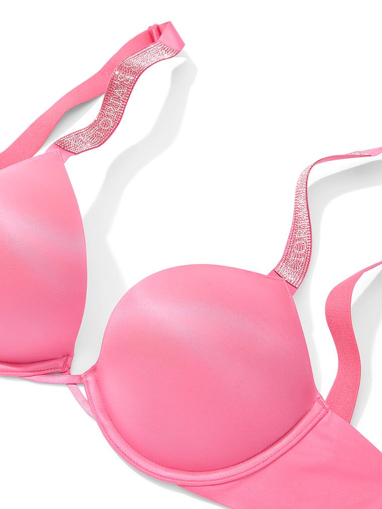 Biustonosz push-up powiększający o 2 rozmiary Bombshell Shine Strap. Produkt ma kolor różowy i pochodzi z kolekcji Very Sexy. 