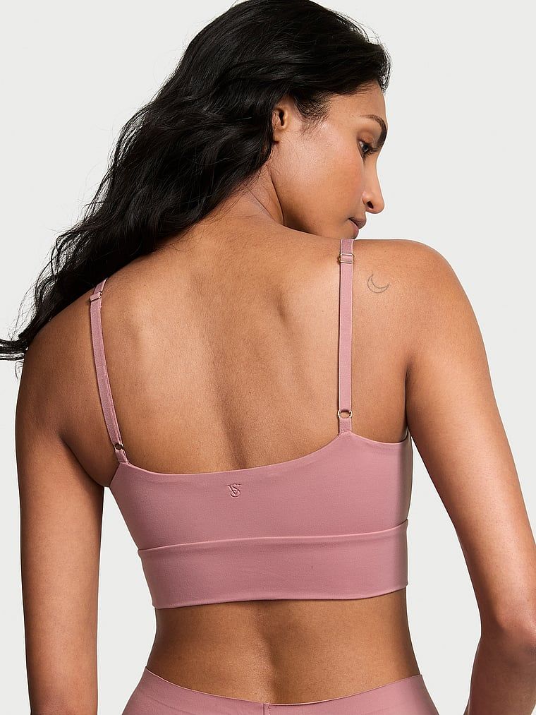 Biustonosz braletka Feathersoft Essentials. Produkt ma kolor różowy i pochodzi z kolekcji Victoria's Secret. 