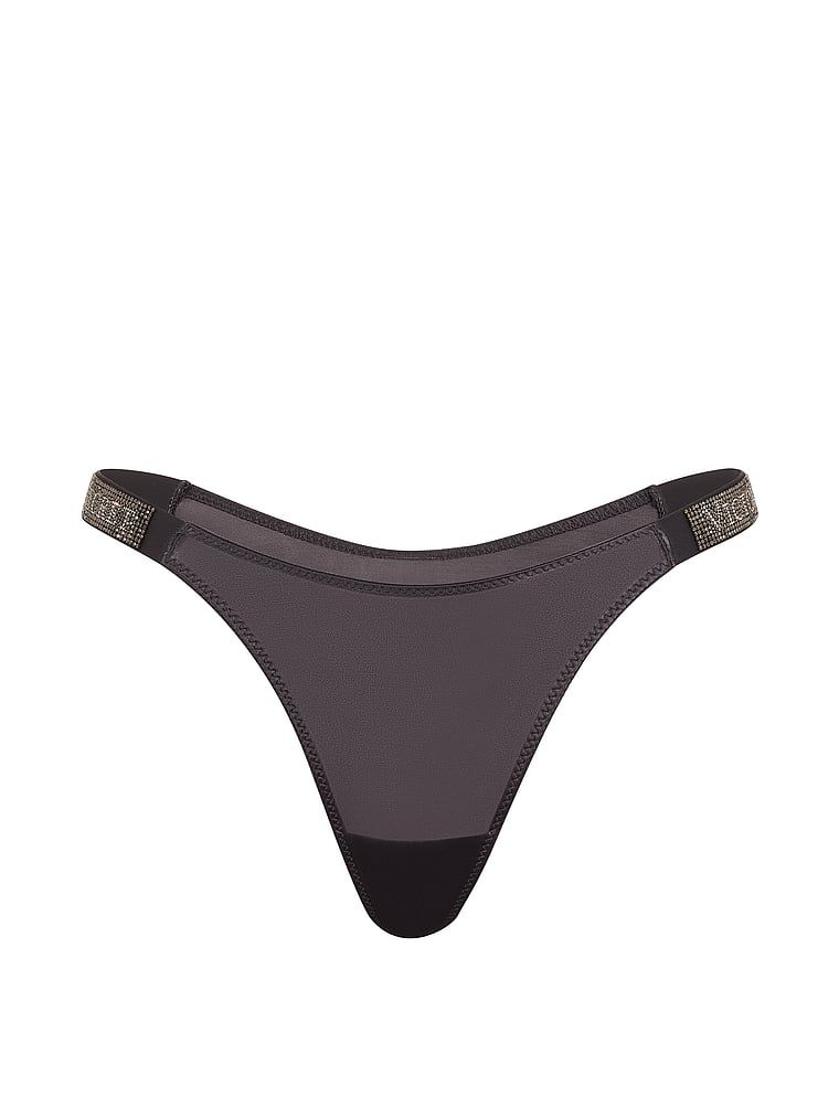 Stringi z błyszczącymi paskami Shine Strap. Produkt ma kolor szary i pochodzi z kolekcji Very Sexy. 