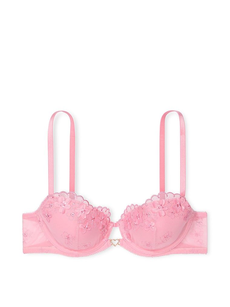 Na zdjęciu na białym tle widoczny jest biustonosz lekko usztywniany Pretty Petals Demi. Produkt ma kolor różowy i pochodzi z kolekcji Dream Angels.