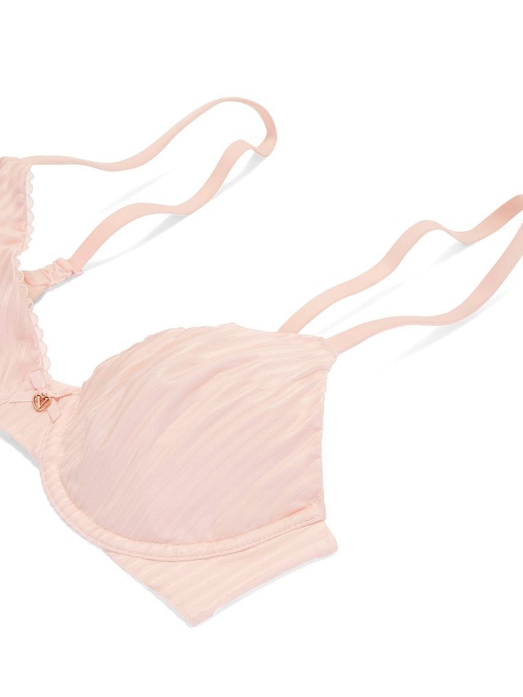 Biustonosz nieusztywniany Invisible Lift Demi. Produkt ma kolor różowy i pochodzi z kolekcji Body by Victoria. 