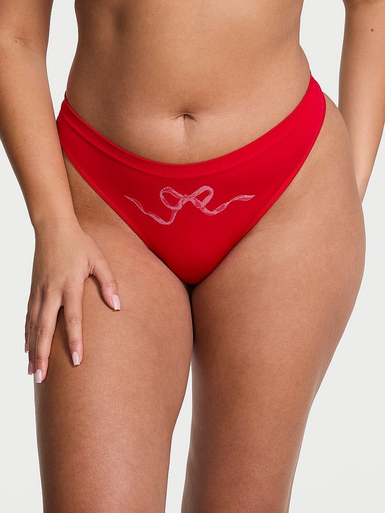 Stringi z kokardką Seamless Bow. Produkt ma kolor czerwony i pochodzi z kolekcji Seamless. 