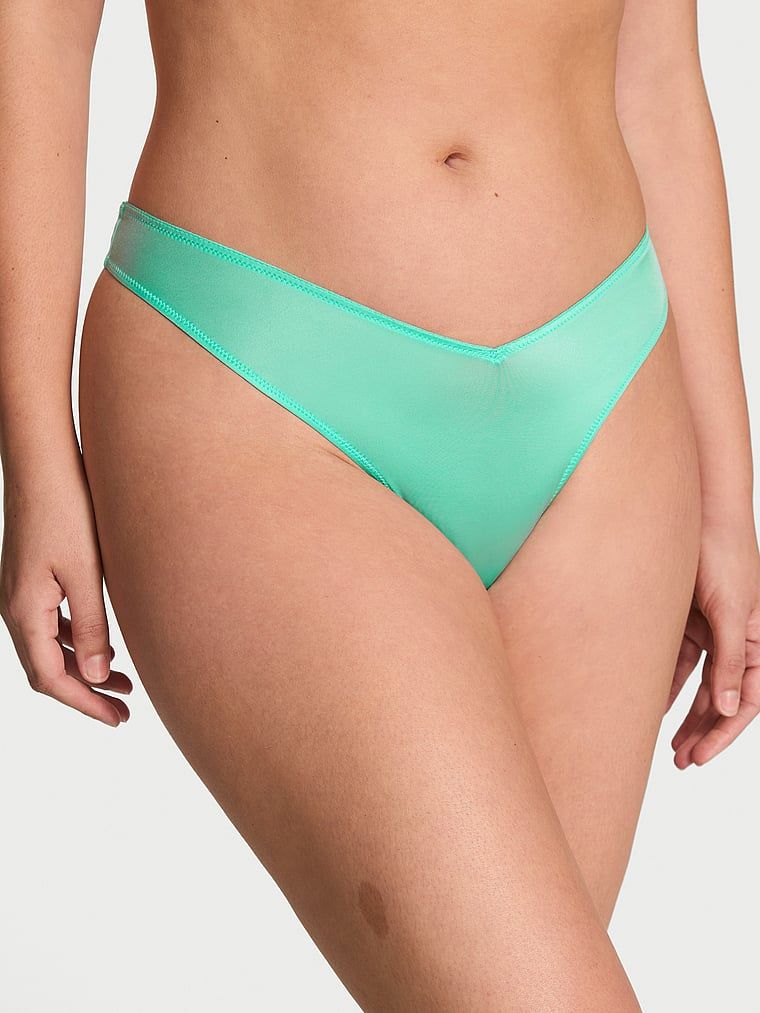 Stringi z paseczkami z tyłu i wysoko wyciętymi nogawkami Strappy-Back High-Leg. Produkt ma kolor niebieski i pochodzi z kolekcji Very Sexy. 