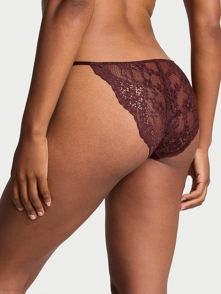 Majtki koronkowe z regulowanymi paskami Bikini. Produkt ma kolor czerwony i pochodzi z kolekcji Dream Angels. 