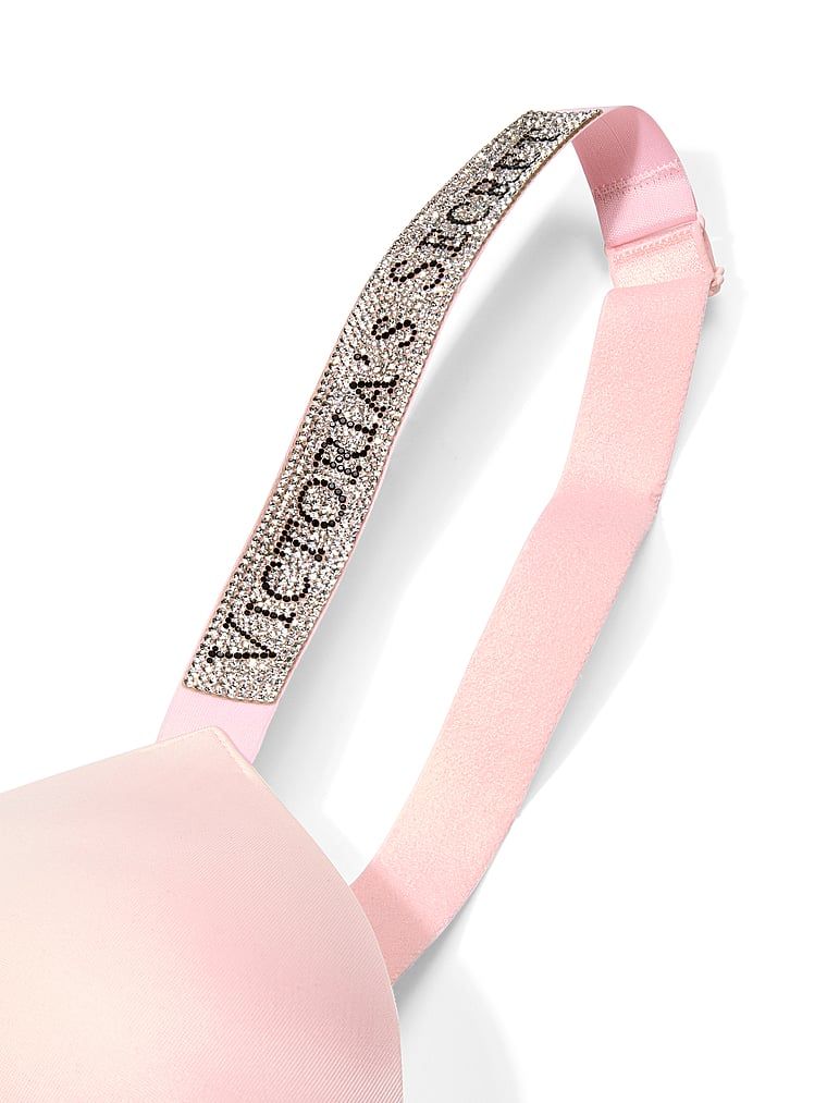 Biustonosz push-up powiększający o 2 rozmiary Bombshell Shine Strap. Produkt ma kolor różowy i pochodzi z kolekcji Very Sexy. 