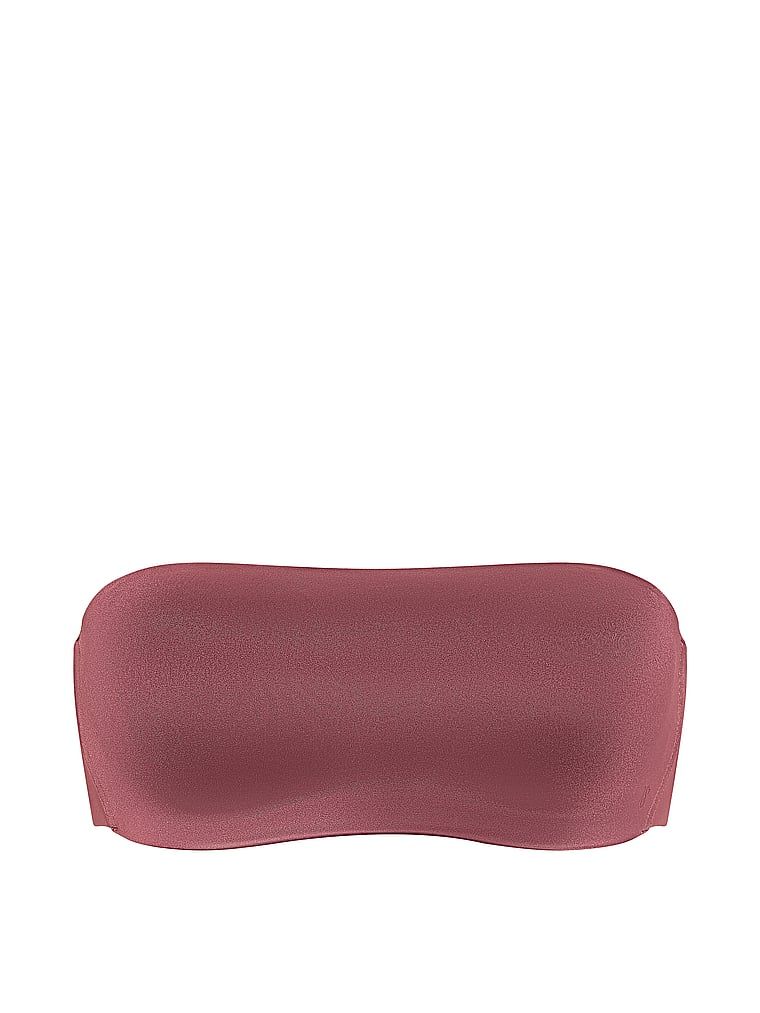 Biustonosz push-up bez ramiączek i bez fiszbin Bandeau. Produkt ma kolor różowy i pochodzi z kolekcji Invisible by Victoria's Secret. 