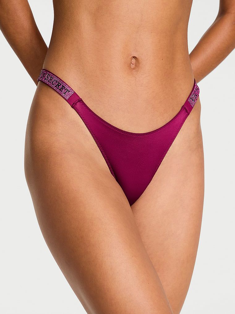 Majtki brazyliany z błyszczącymi paskami Shine Strap Brazilian. Produkt ma kolor różowy i pochodzi z kolekcji Very Sexy. 