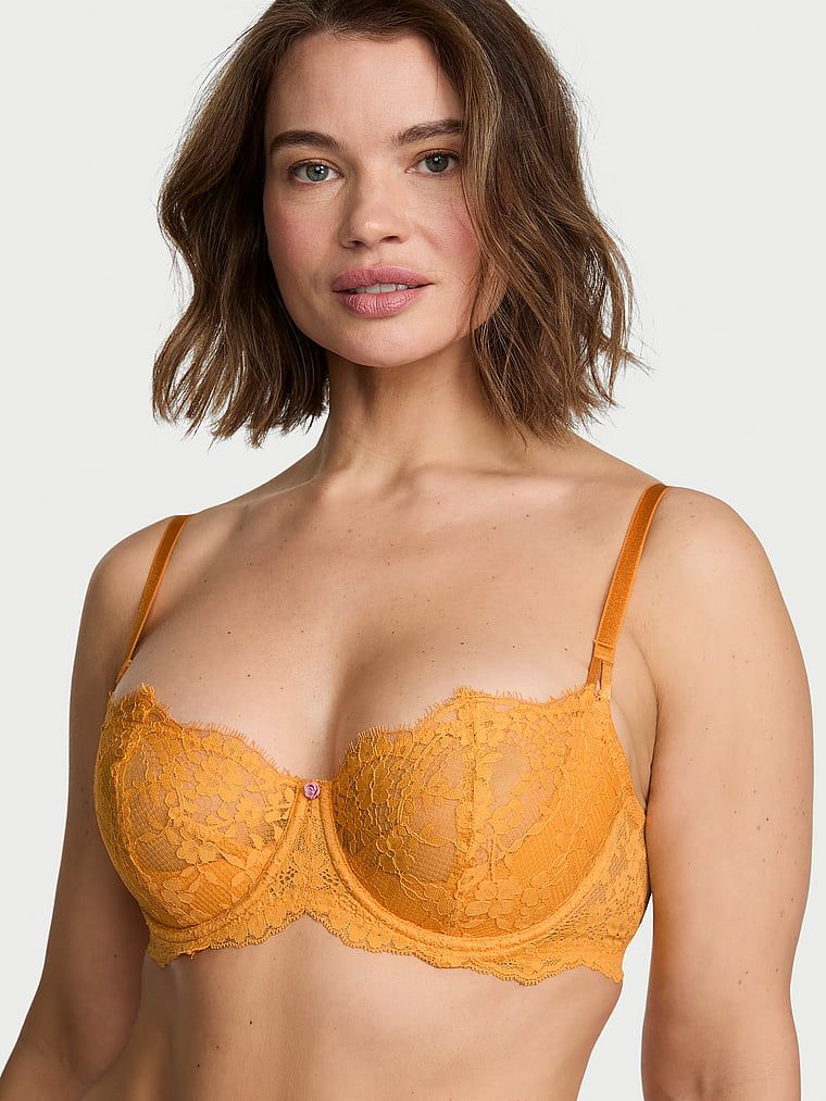 Biustonosz nieusztywniany balkonetka Wicked Lace Balconette. Produkt ma kolor pomarańczowy i pochodzi z kolekcji Dream Angels. 
