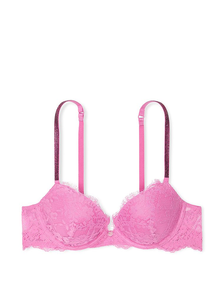 Na zdjęciu na białym tle widoczny jest biustonosz push-up koronkowy z błyszczącymi ramiączkami Twinkle Strap. Produkt ma kolor różowy i pochodzi z kolekcji Dream Angels.