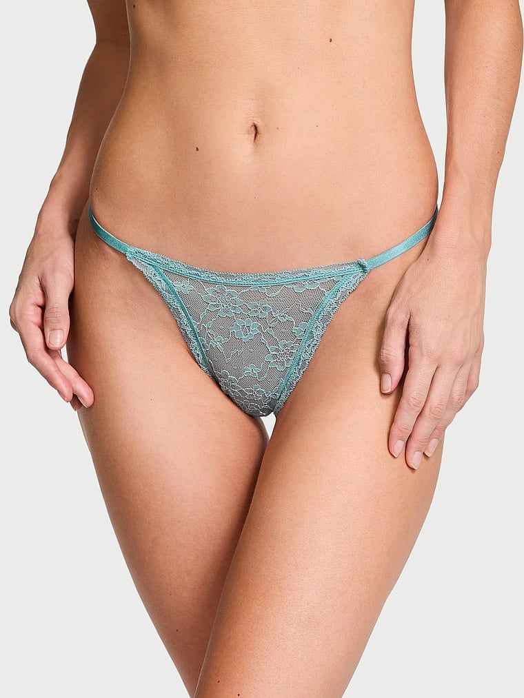 Stringi koronkowe Lace. Produkt ma kolor niebieski i pochodzi z kolekcji Lacie. 