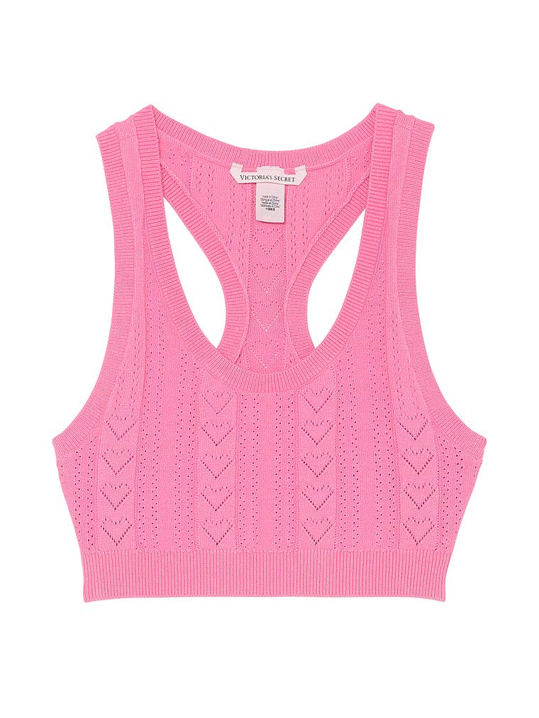 Na zdjęciu na białym tle widoczny jest biustonosz braletka z dziurkowanego materiału Luxe Heart Pointelle. Produkt ma kolor różowy i pochodzi z kolekcji Victoria's Secret.