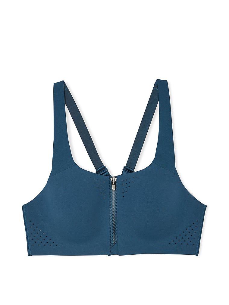 Na zdjęciu na białym tle widoczny jest biustonosz sportowy z maksymalnym podtrzymaniem z suwakiem Featherweight Max Front-Close. Produkt ma kolor niebieski i pochodzi z kolekcji VSX.