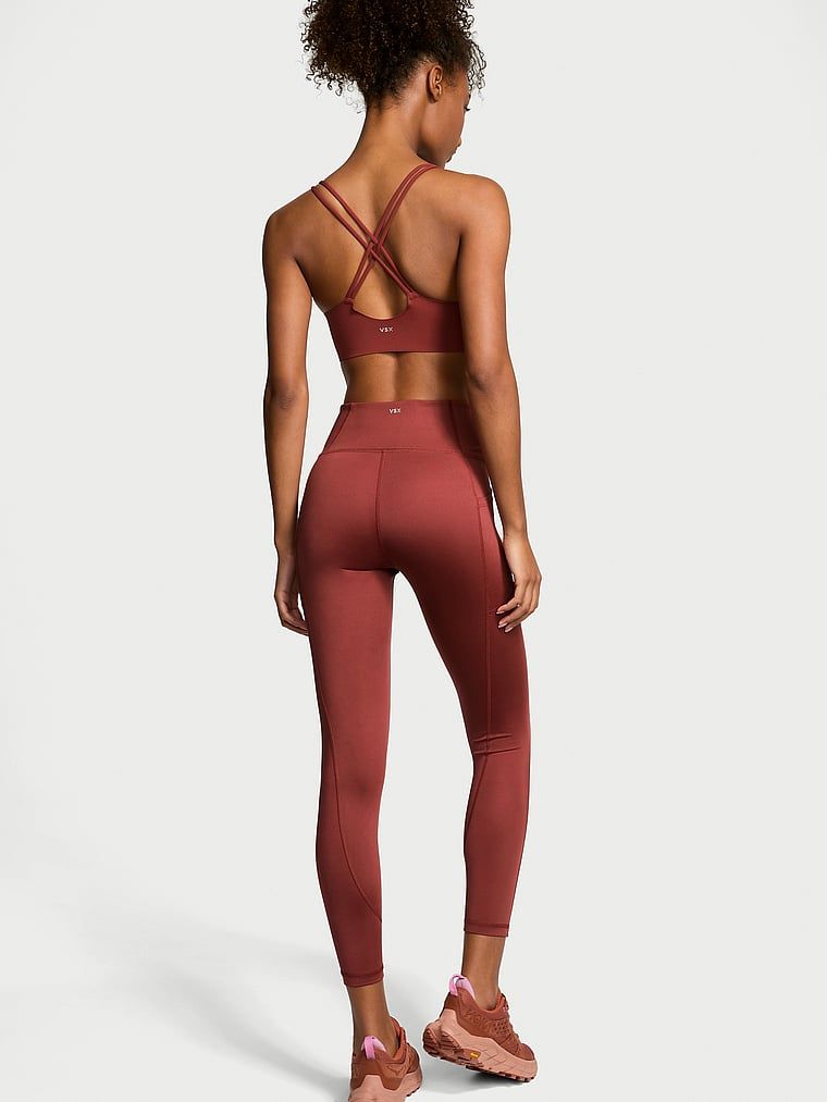 Legginsy z kieszeniami Essential Pocket. Produkt ma kolor czerwony i pochodzi z kolekcji VSX. 