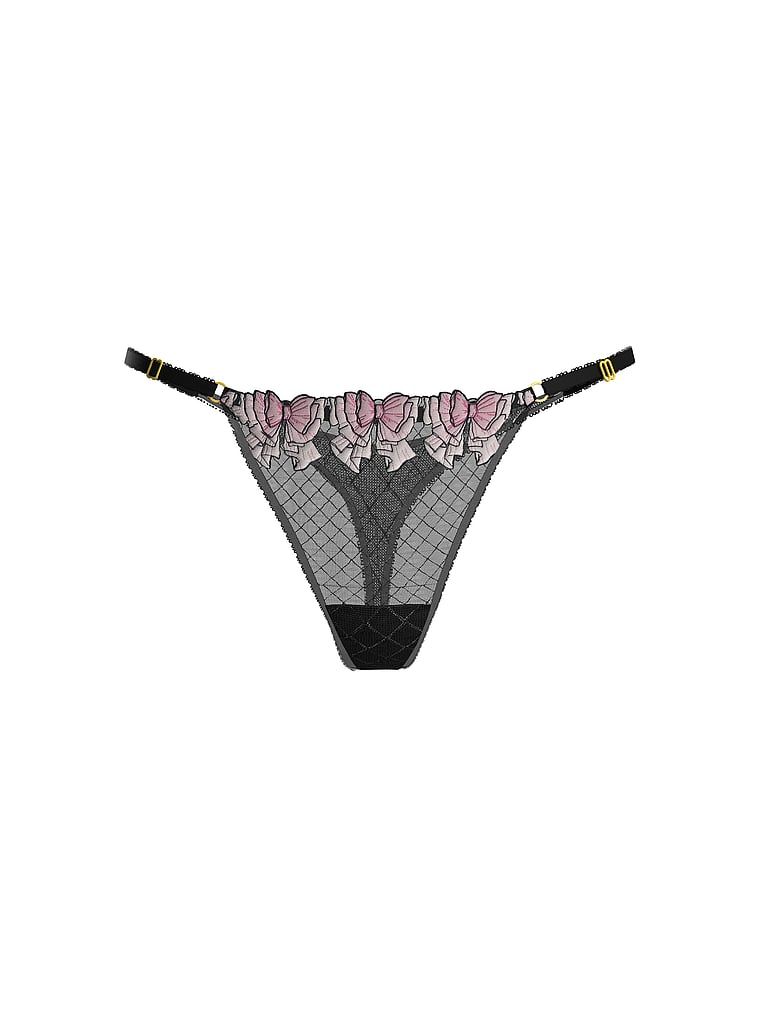 Stringi z regulowanymi paseczkami Tease Bow. Produkt jest wzorzysty i pochodzi z kolekcji Victoria's Secret. 