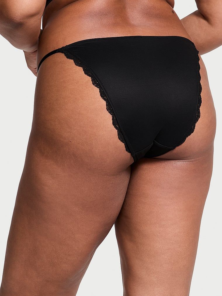 Majtki z regulowanymi paskami z koronką Lace-Trim Bikini. Produkt ma kolor czarny i pochodzi z kolekcji Dream Angels. 