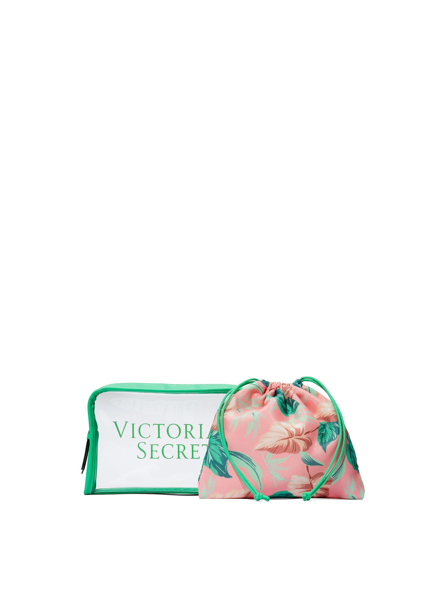 Przezroczysta kosmetyczka Victoria's Secret z zielonymi brzegami, w środku różowa kosmetyczka z tropikalnym wzorem.