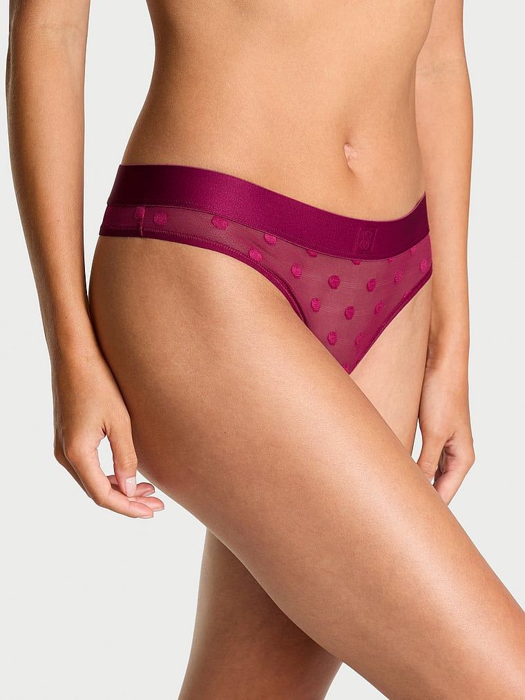 Stringi z siateczki Sheer Heritage Logo. Produkt ma kolor różowy i pochodzi z kolekcji Cotton. 