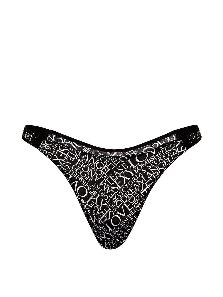 Stringi z błyszczącymi paskami Shine Strap. Produkt ma kolor wzorzysty i pochodzi z kolekcji Very Sexy. 