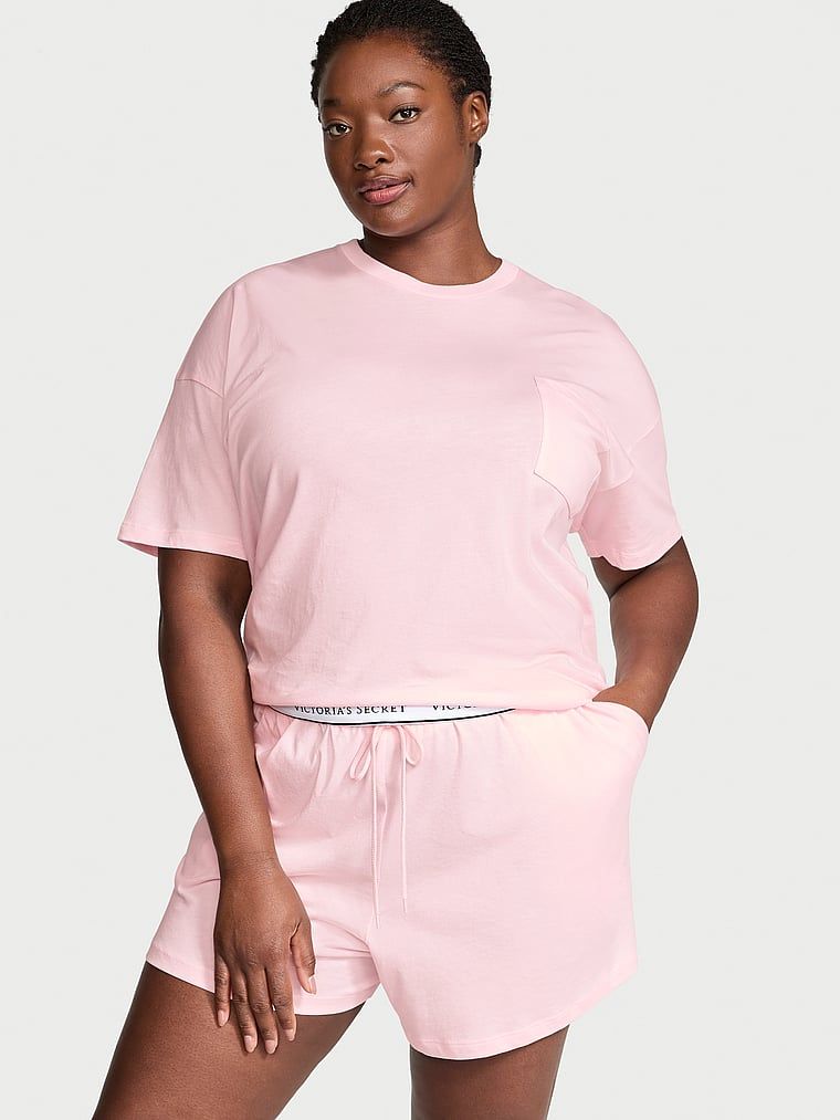 Piżama bawełniana z krótkimi rękawami i szortami. Produkt ma kolor różowy i pochodzi z kolekcji Victoria's Secret. 