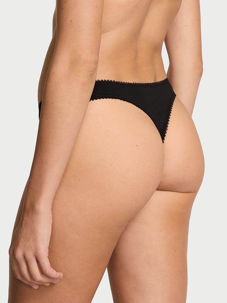 Stringi bawełniane z cekinami Sparkle. Produkt ma kolor czarny i pochodzi z kolekcji Victoria's Secret. 