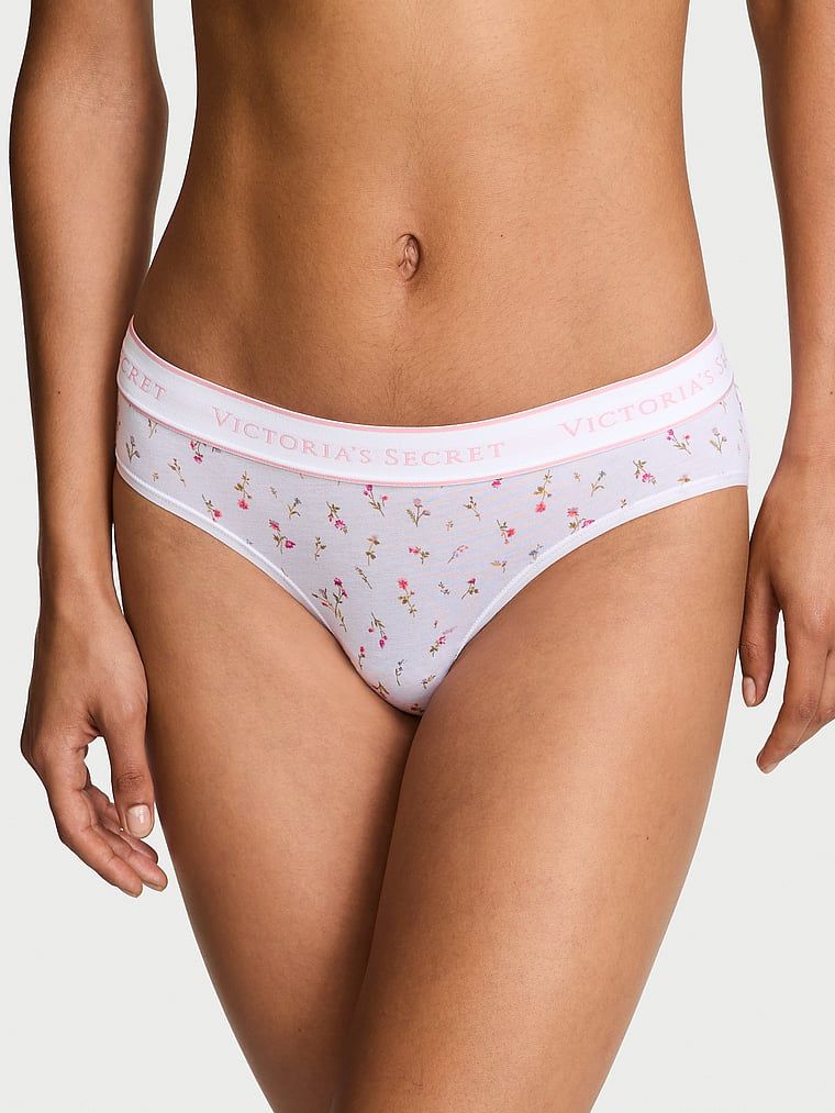 Majtki bawełniane z logo w talii Hiphugger. Produkt ma wzór kwiatowy i pochodzi z kolekcji Body by Victoria. 