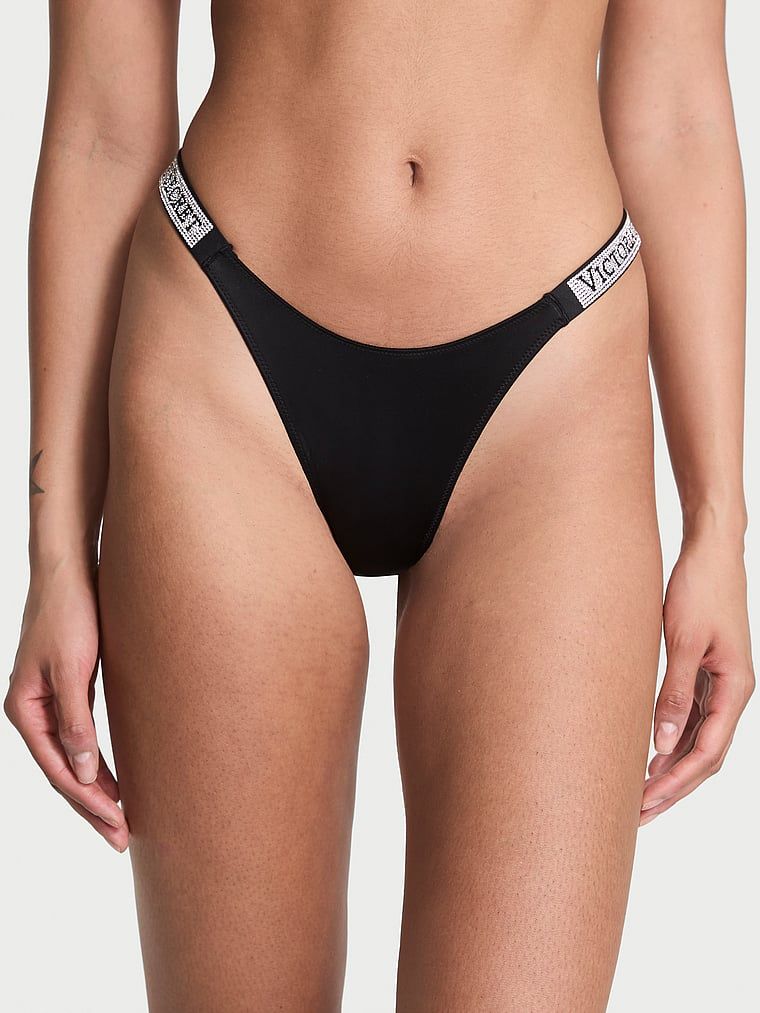 Majtki brazyliany z błyszczącymi paskami Shine Strap Brazilian. Produkt ma kolor czarny i pochodzi z kolekcji Very Sexy. 