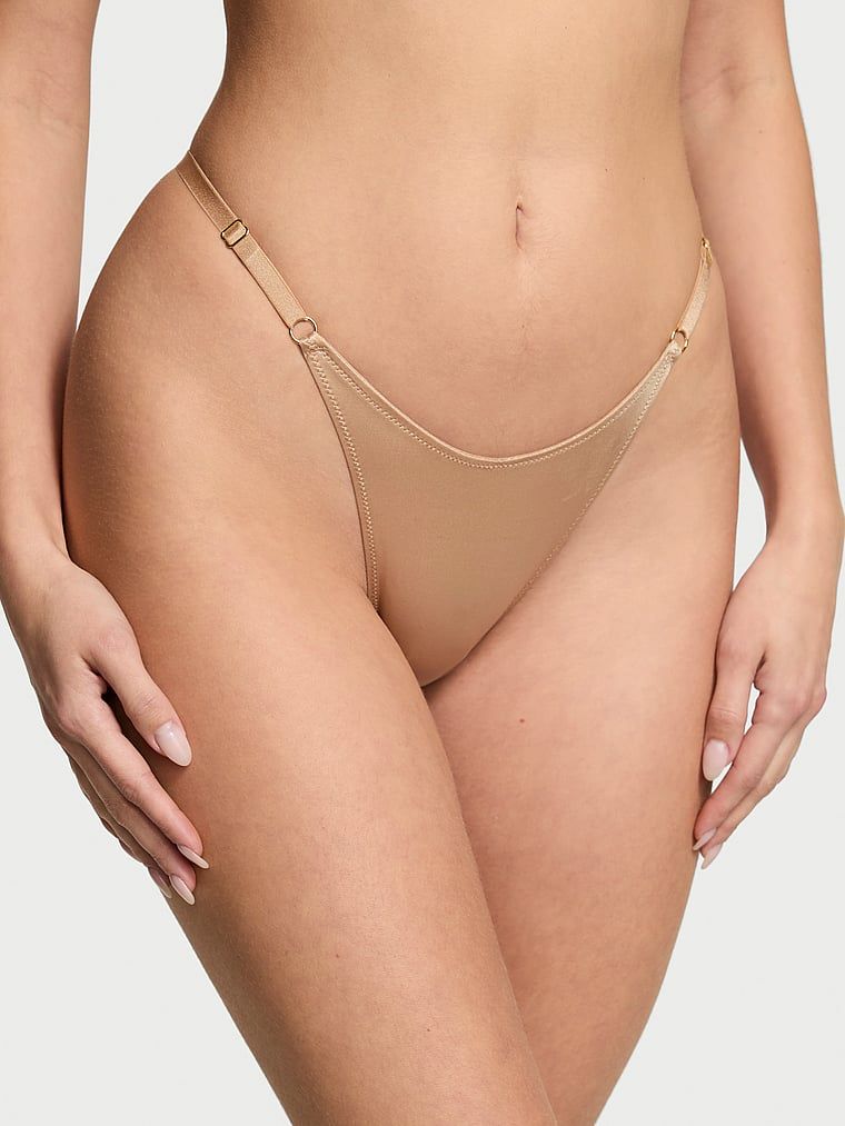Majtki brazyliany z paseczkami z tyłu Brazilian. Produkt ma kolor beżowy i pochodzi z kolekcji Very Sexy. 