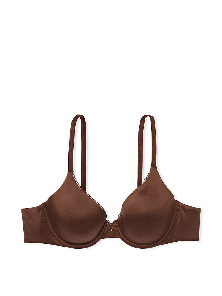 Na zdjęciu na białym tle widoczny jest biustonosz lekko usztywniany z mocno zabudowanymi miseczkami Infinity Edge. Produkt ma kolor brązowy i pochodzi z kolekcji Body by Victoria.