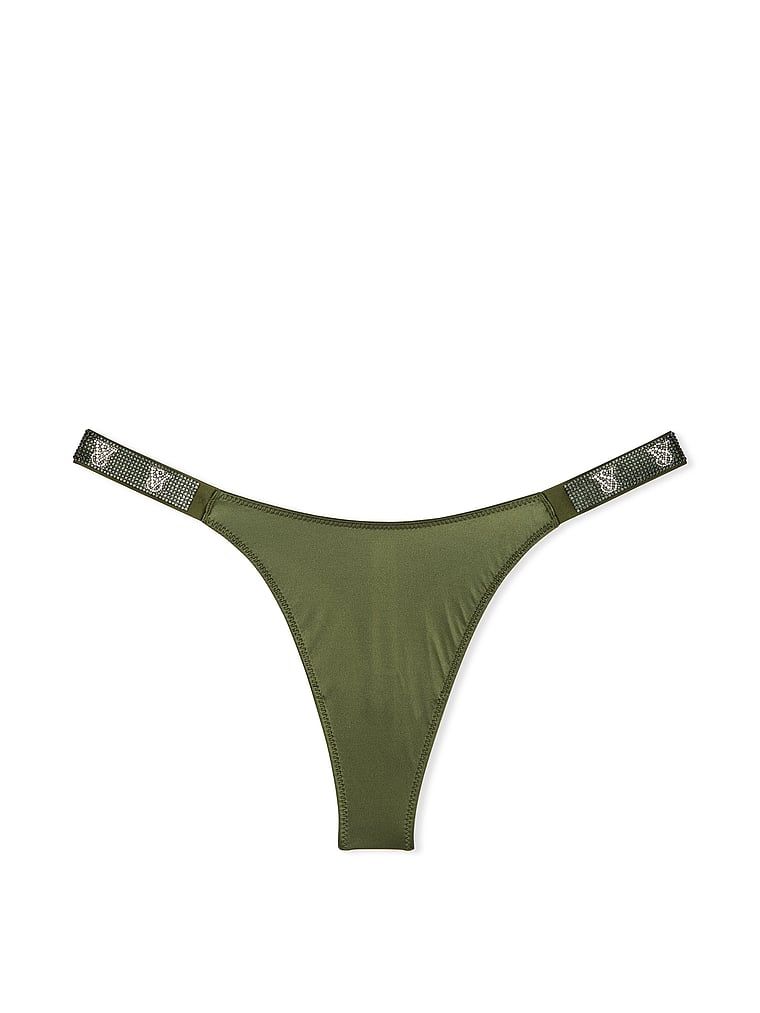 Stringi z błyszczącymi paskami Shine Strap. Produkt ma kolor zielony i pochodzi z kolekcji Very Sexy. 
