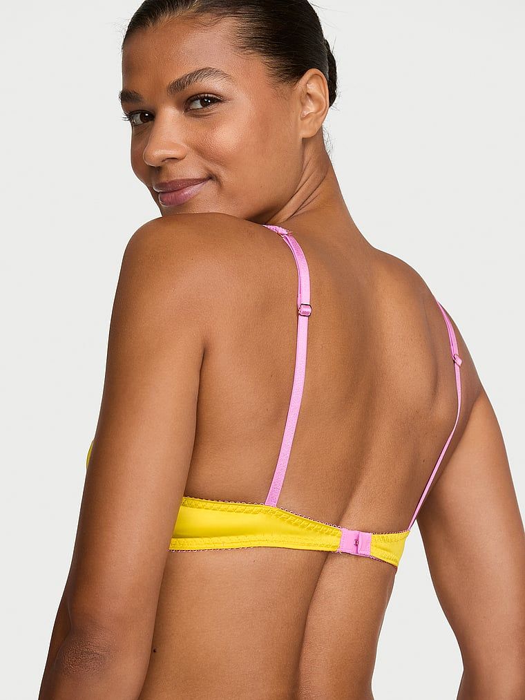Biustonosz nieusztywniany bez fiszbin satynowy Tease. Produkt ma kolor żółty i pochodzi z kolekcji Victoria's Secret. 