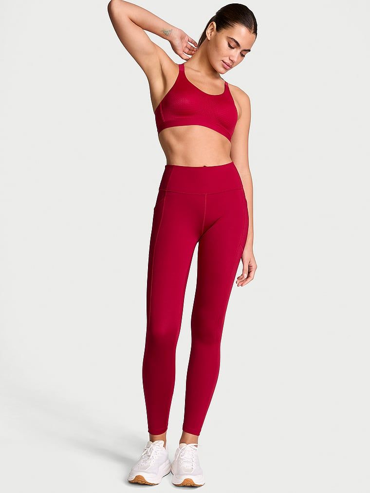 Legginsy z kieszeniami Essential Pocket. Produkt ma kolor czerwony i pochodzi z kolekcji VSX. 