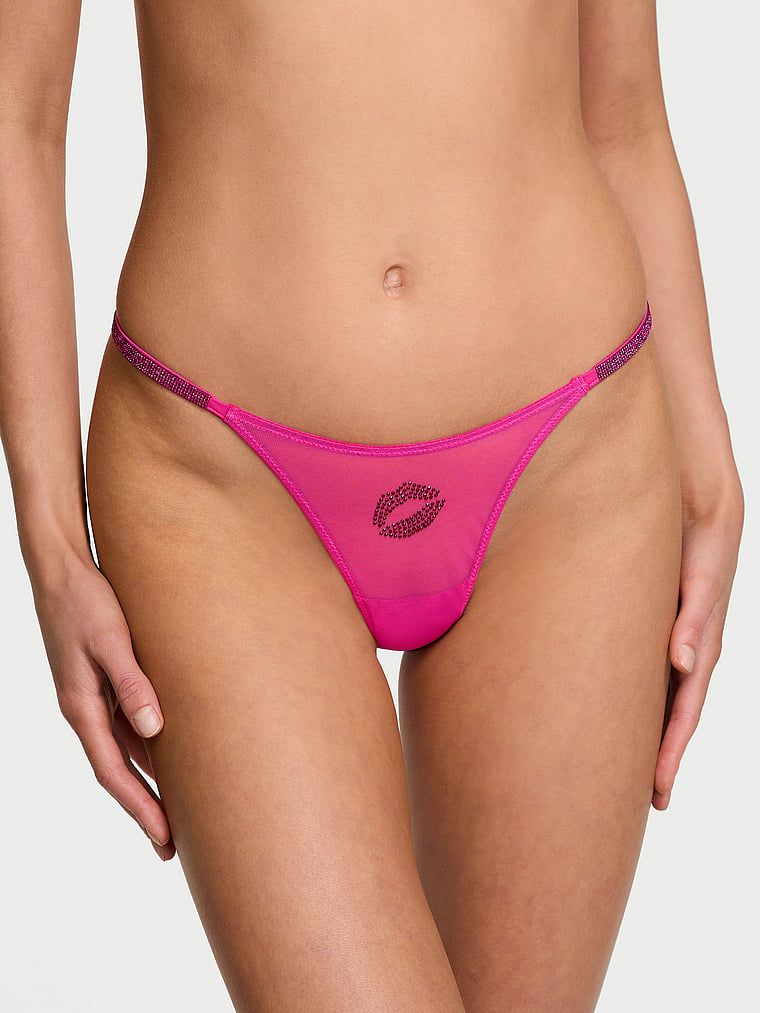 Stringi z siateczki z błyszczącymi paskami Shine Strap. Produkt jest wzorzysty i pochodzi z kolekcji Very Sexy. 