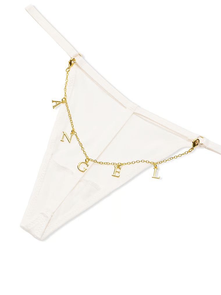 Stringi z łańcuszkiem z tyłu Charm. Produkt ma kolor biały i pochodzi z kolekcji Very Sexy. 