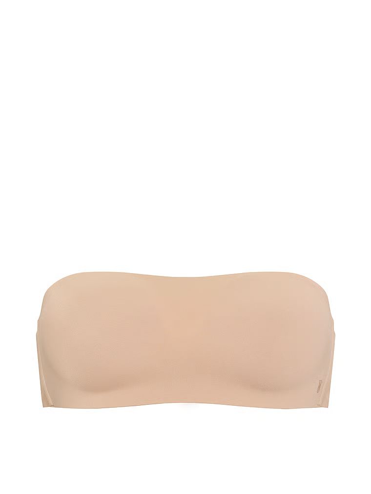 Na zdjęciu na białym tle widoczny jest biustonosz push-up bez ramiączek i bez fiszbin Perfect Comfort Strapless. Produkt ma kolor beżowy i pochodzi z kolekcji Victoria's Secret Bare.