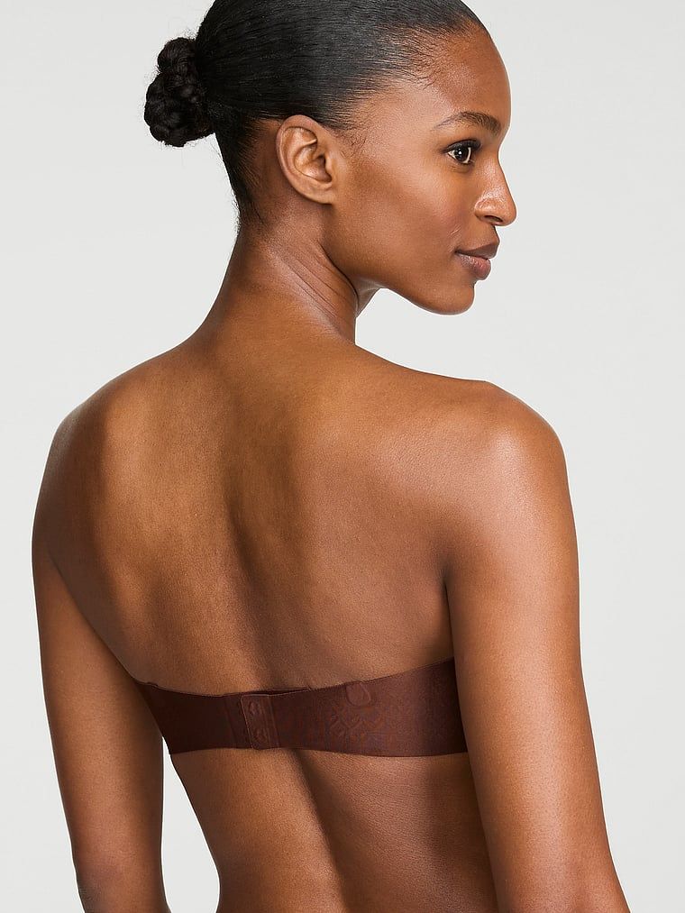 Biustonosz push-up bez ramiączek Uplift Strapless. Produkt ma kolor brązowy i pochodzi z kolekcji Invisible by Victoria's Secret. 