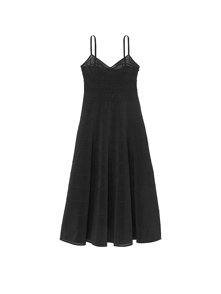 Suknia wieczorowa z prześwitującymi wstawkami Atelier X Altuzarra. Produkt ma kolor czarny i pochodzi z kolekcji Atelier Victoria's Secret x Altuzarra. 
