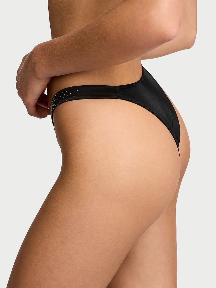 Majtki brazyliany z błyszczącymi paseczkami Scattered Shine Strap. Produkt ma kolor czarny i pochodzi z kolekcji Very Sexy. 