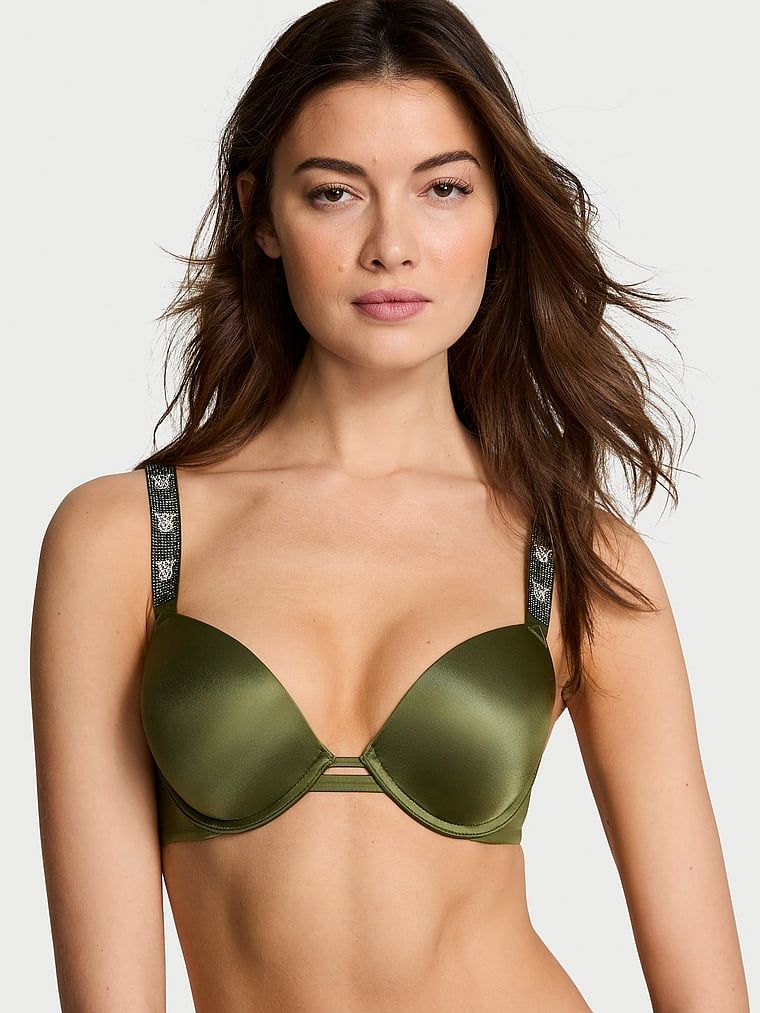 Modelka prezentuje biustonosz push-up Shine Strap. Produkt ma kolor zielony i pochodzi z kolekcji Very Sexy.