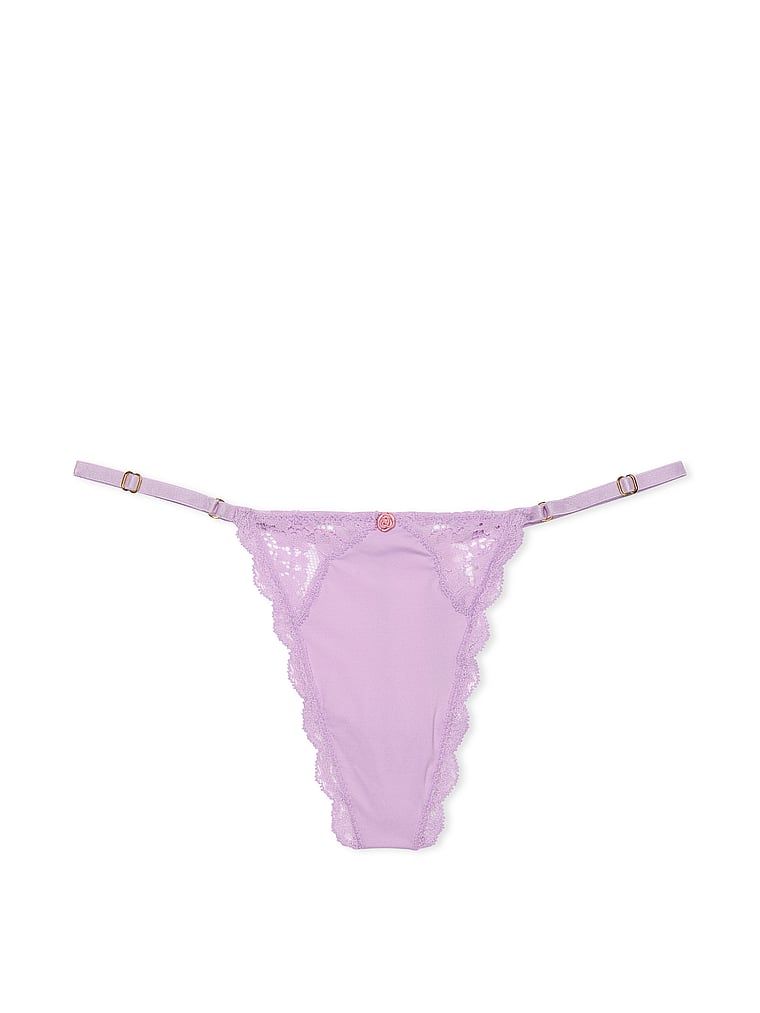 Stringi z koronką z regulowanymi paskami Lace-Trim V-String. Produkt ma kolor purpurowy i pochodzi z kolekcji Dream Angels. 