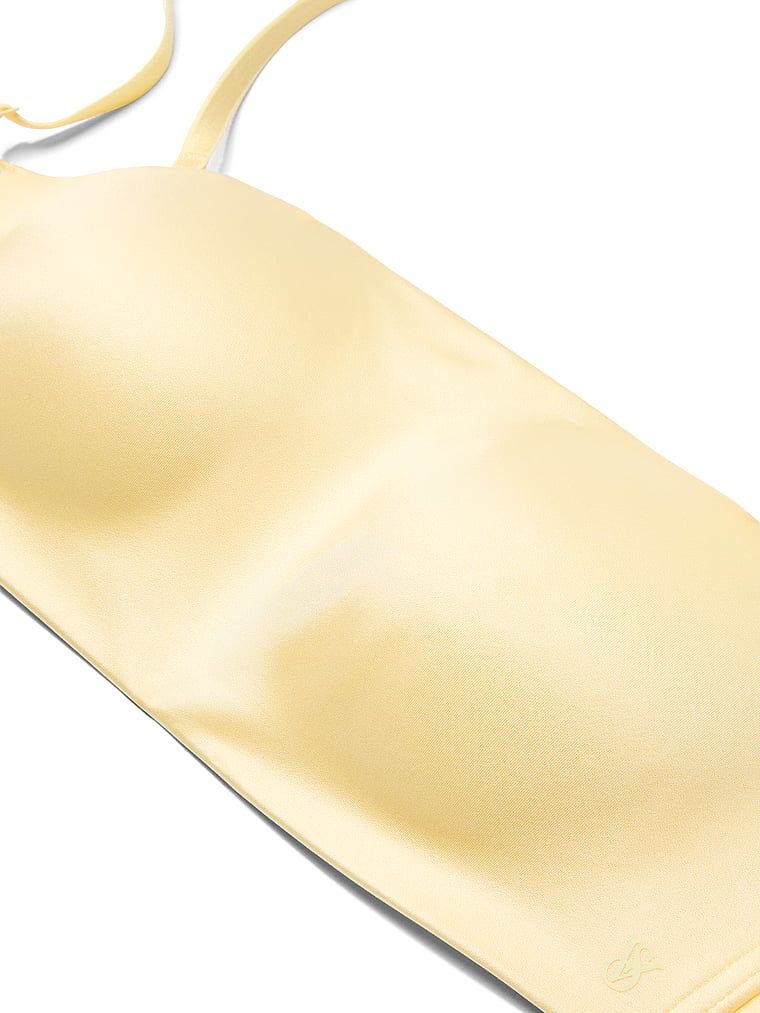 Biustonosz push-up bez ramiączek i bez fiszbin Bandeau. Produkt ma kolor żółty i pochodzi z kolekcji Invisible by Victoria's Secret. 