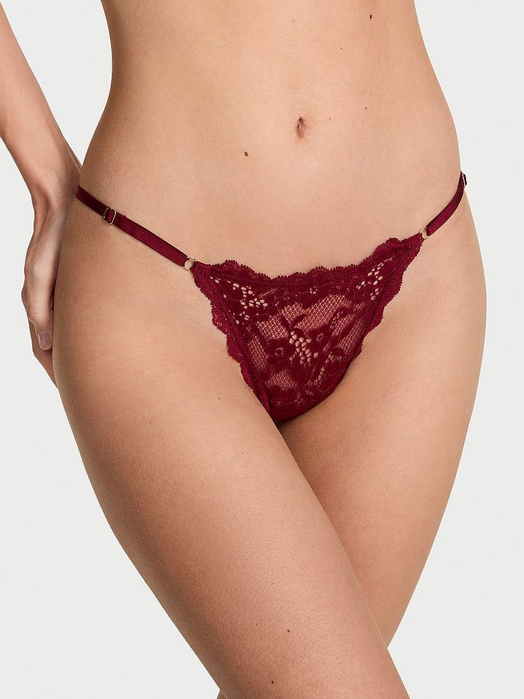 Stringi koronkowe z regulowanymi paskami Lace V-String. Produkt ma kolor czerwony i pochodzi z kolekcji Dream Angels. 
