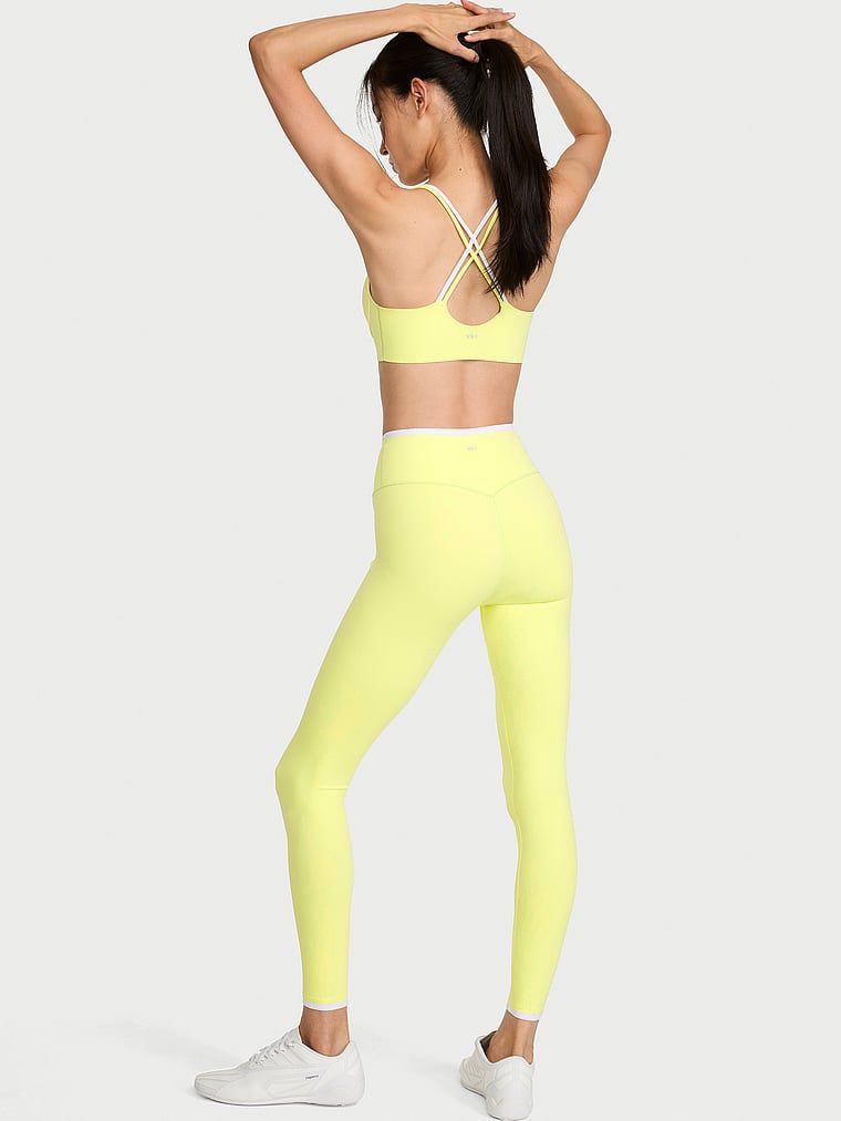 Legginsy z niską kompresją VS Elevate. Produkt ma kolor zielony i pochodzi z kolekcji VSX. 