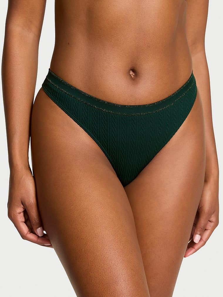 Stringi bezszwowe Cable-Knit. Produkt ma kolor zielony i pochodzi z kolekcji Seamless. 