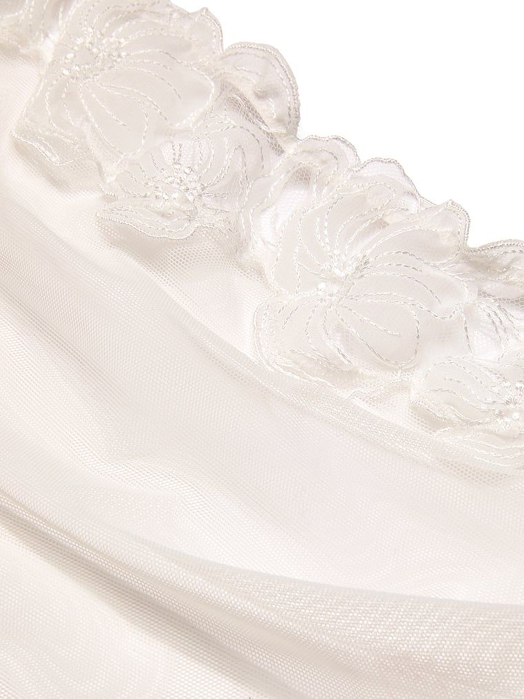 Body z prześwitującej siateczki bez kroku Frou Frou. Produkt jest wzorzysty i pochodzi z kolekcji Dream Angels. 