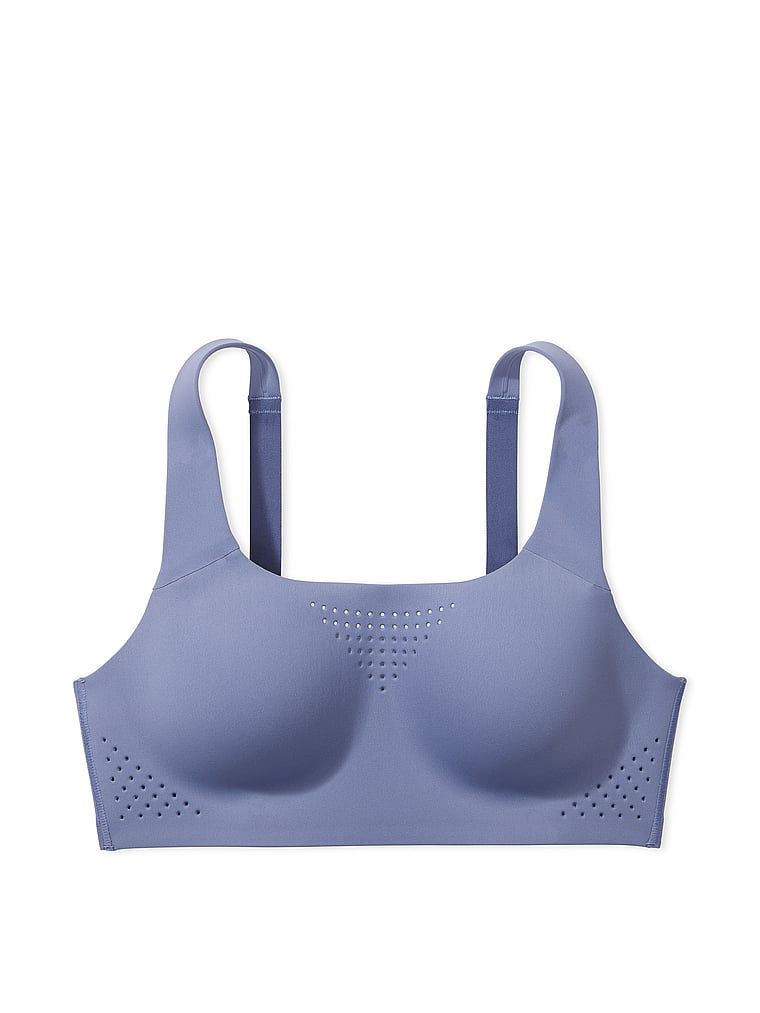 Na zdjęciu na białym tle widoczny jest biustonosz sportowy z maksymalnym podtrzymaniem Featherweight Max. Produkt ma kolor niebieski i pochodzi z kolekcji Victoria's Secret.