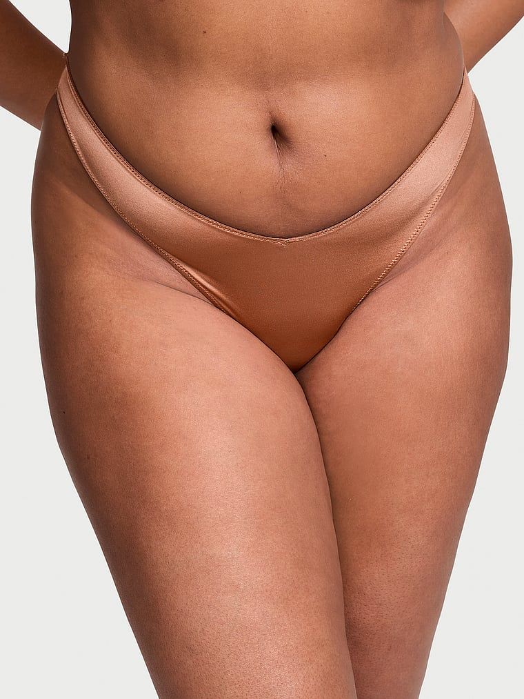 Stringi z paseczkami z tyłu i wysoko wyciętymi nogawkami Strappy-Back High-Leg. Produkt ma kolor brązowy i pochodzi z kolekcji Very Sexy. 