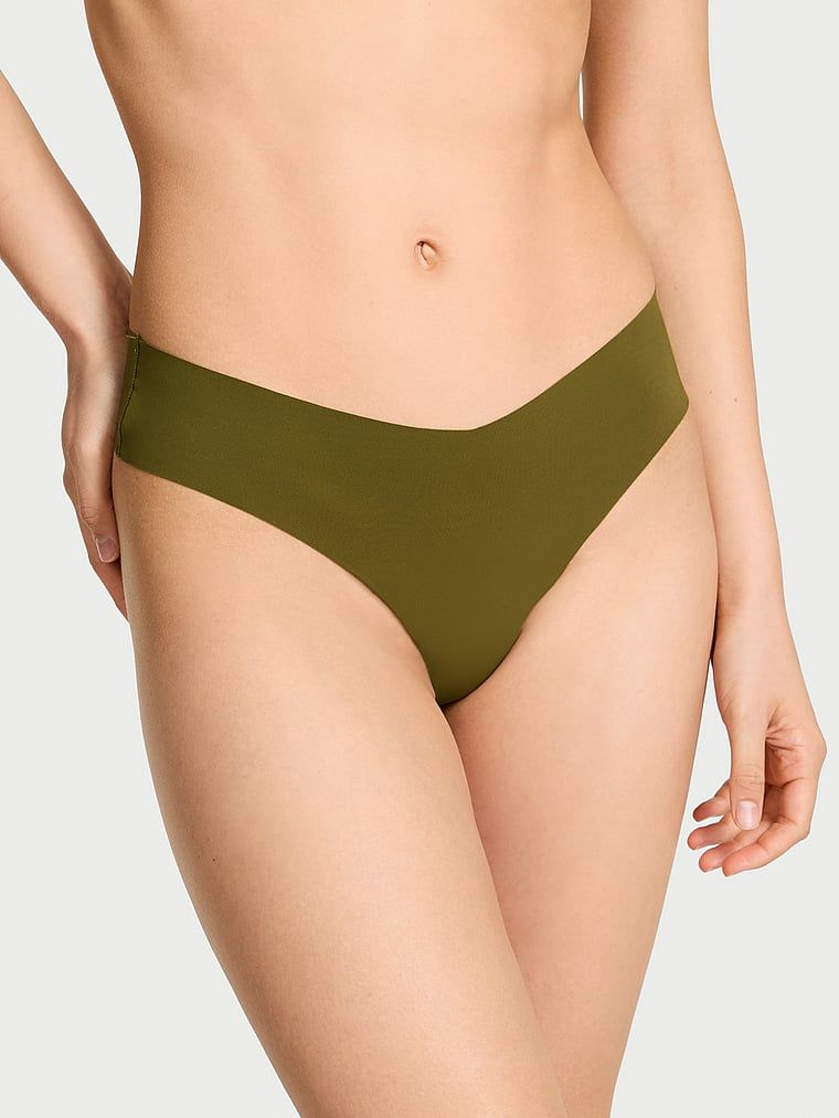 Stringi bezszwowe z paseczkami z tyłu No-Show Strappy. Produkt ma kolor zielony i pochodzi z kolekcji No-Show. 