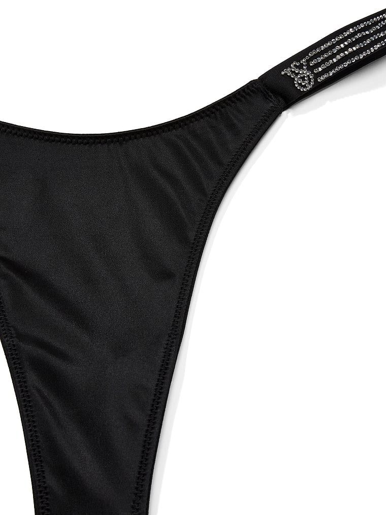 Stringi z błyszczącymi paskami Stripe Shine. Produkt ma kolor czarny i pochodzi z kolekcji Very Sexy. 