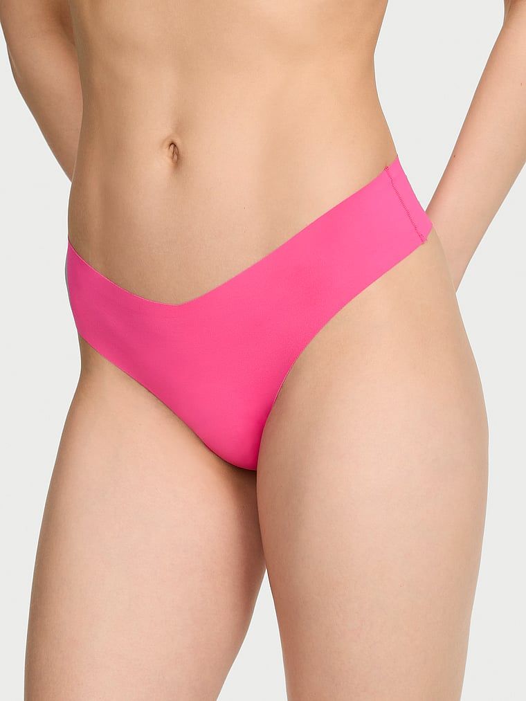 Stringi bezszwowe z paseczkami z tyłu No-Show Strappy. Produkt ma kolor różowy i pochodzi z kolekcji No-Show. 